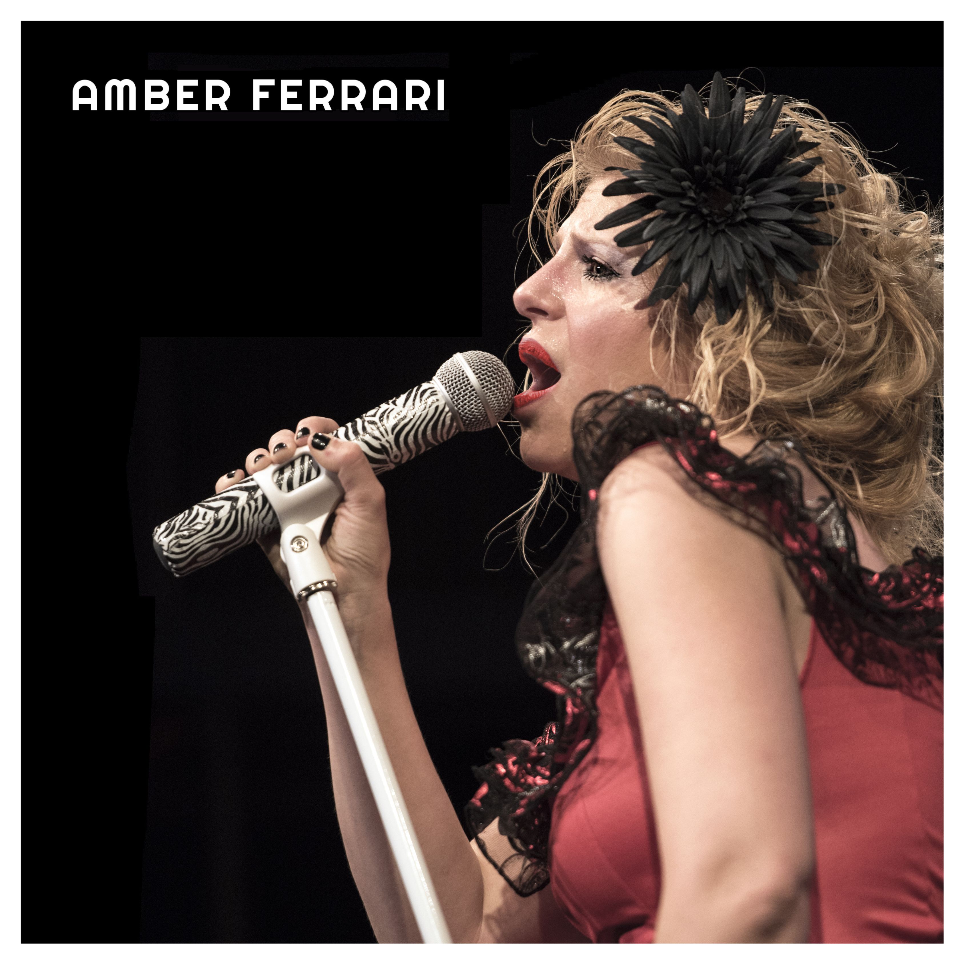 woman singing into a microphone
